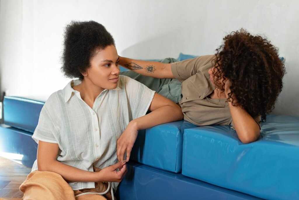 People engaging in a supportive conversation, representing healthy communication and connection